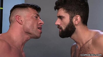 Muscular Men Sharing The Ass Of A Bearded Guy