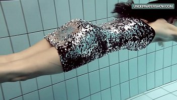 Loris Blackhaired Teen Swirling In The Pool