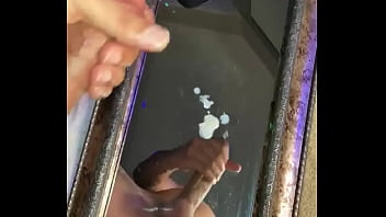 Moaning While He Blows A Huge Cumshot On A Mirror