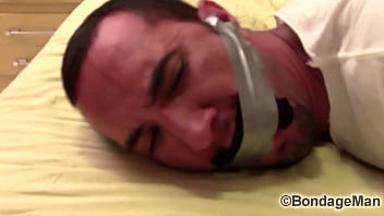 Victor Sockgagged And Tapegagged Tight And Captured With Socks Inside His Mouth Wrapped The Tape Around His Head Preview