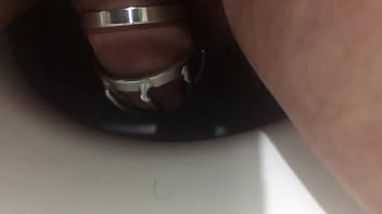 Another Peeing In The Metal Chastity Cage. Video Report For My Mistress Who Locked Me In This Chastity Belt Till The Weekend.