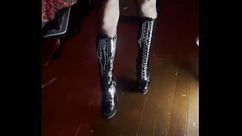 Sexy Dominatrix Showing Off Her Outfit In Homemade Dungeon