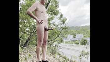 Rob Venuta Poses By A Busy Road In The Middle Of The Afternoon Completely Visible To Drivers