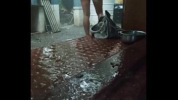 Indian Boy Bathing In Rain